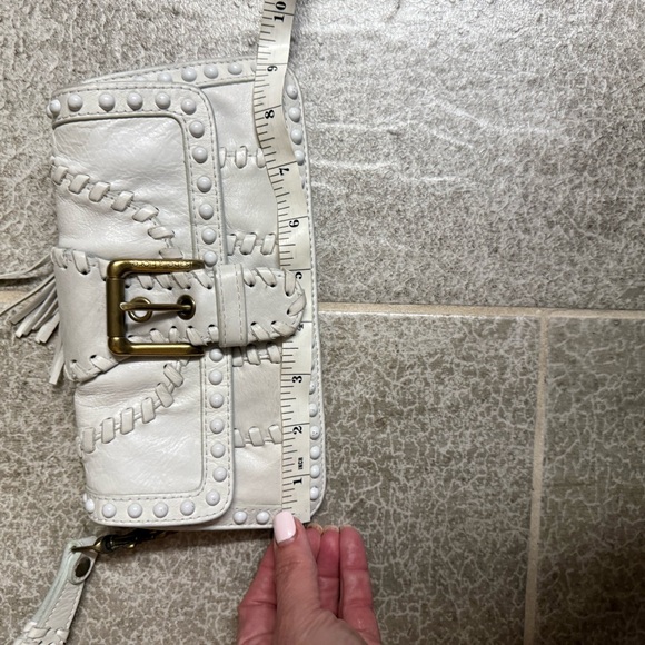 Isabella Fiore Cream Leather Clutch/wristlet with Tassel, Buckle, and studs - Picture 12 of 12
